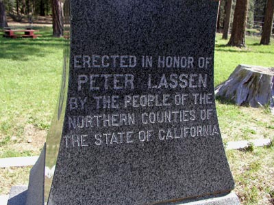 A monument that reads "Erected in honor of Peter Lassen. By the people of the northern counties of the state of California"